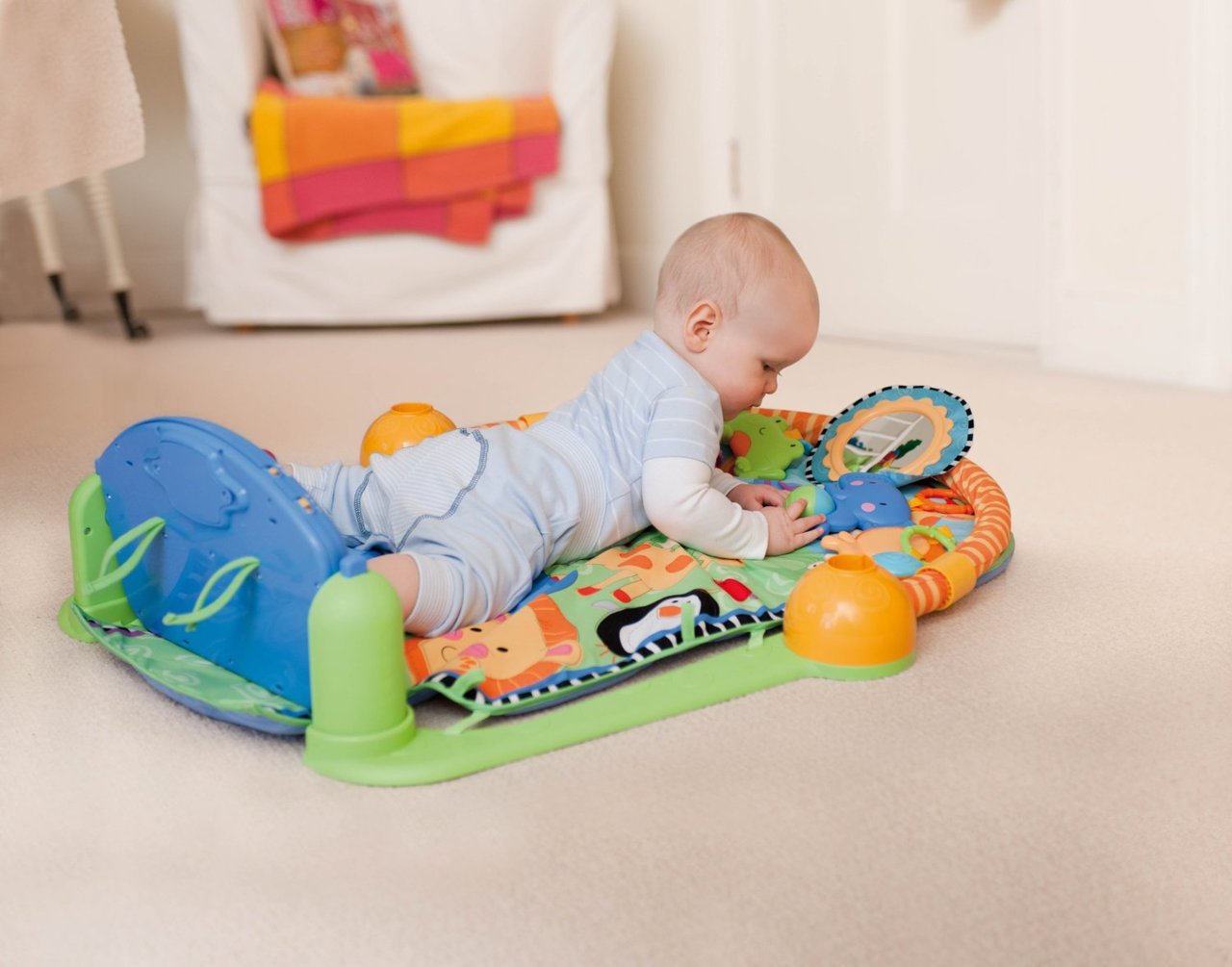 kick and play crib piano